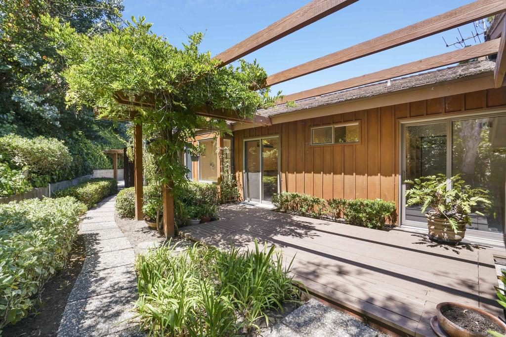 7675 Via Capri La Jolla, CA 92037 - Photo 63 of 75 a front view of a house with a yard