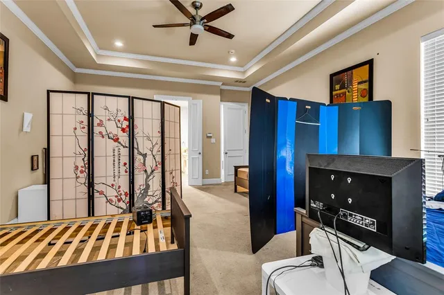 a bedroom with furniture and a fireplace