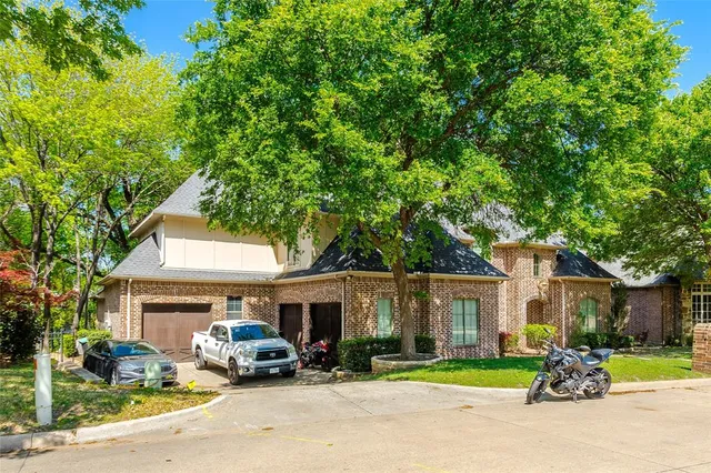 a car parked in front of a house