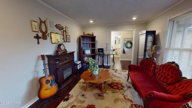 a bedroom with furniture and a chandelier
