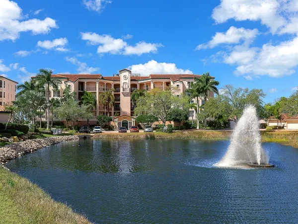 a view of a lake with a house