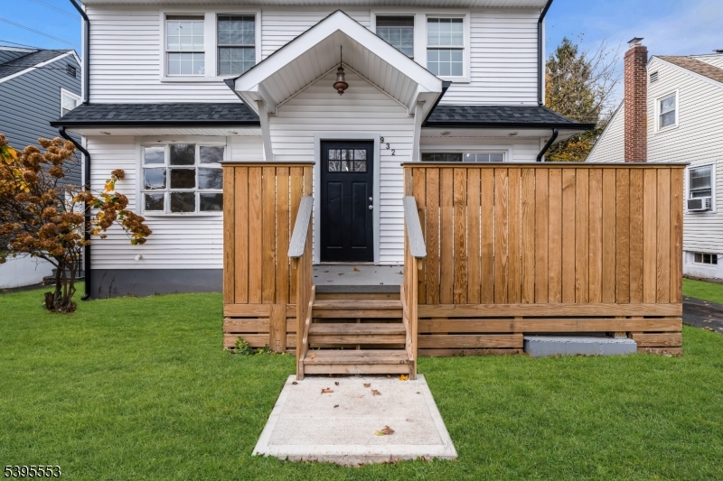 932 Wheatsheaf Road Roselle, NJ 07203 - Photo 6 of 44 a front view of a house with garden