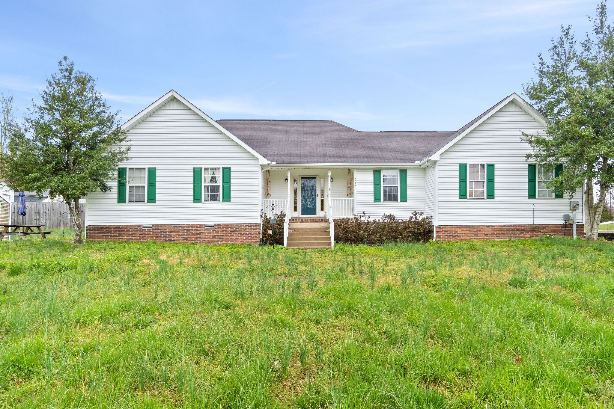 4450 Old Metal Road Palmyra, TN 37142 - Photo 1 of 38 a front view of house with yard and green space