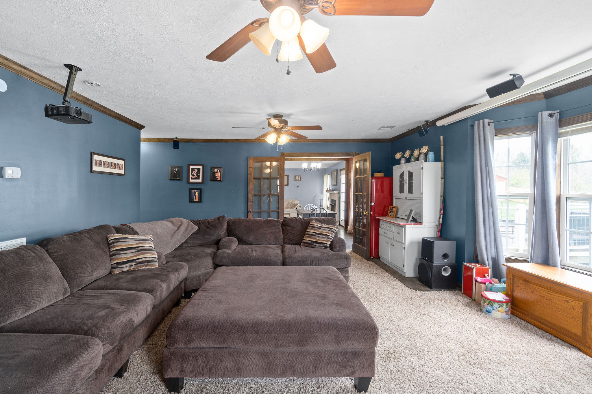 4450 Old Metal Road Palmyra, TN 37142 - Photo 17 of 38 a living room with furniture and a large window