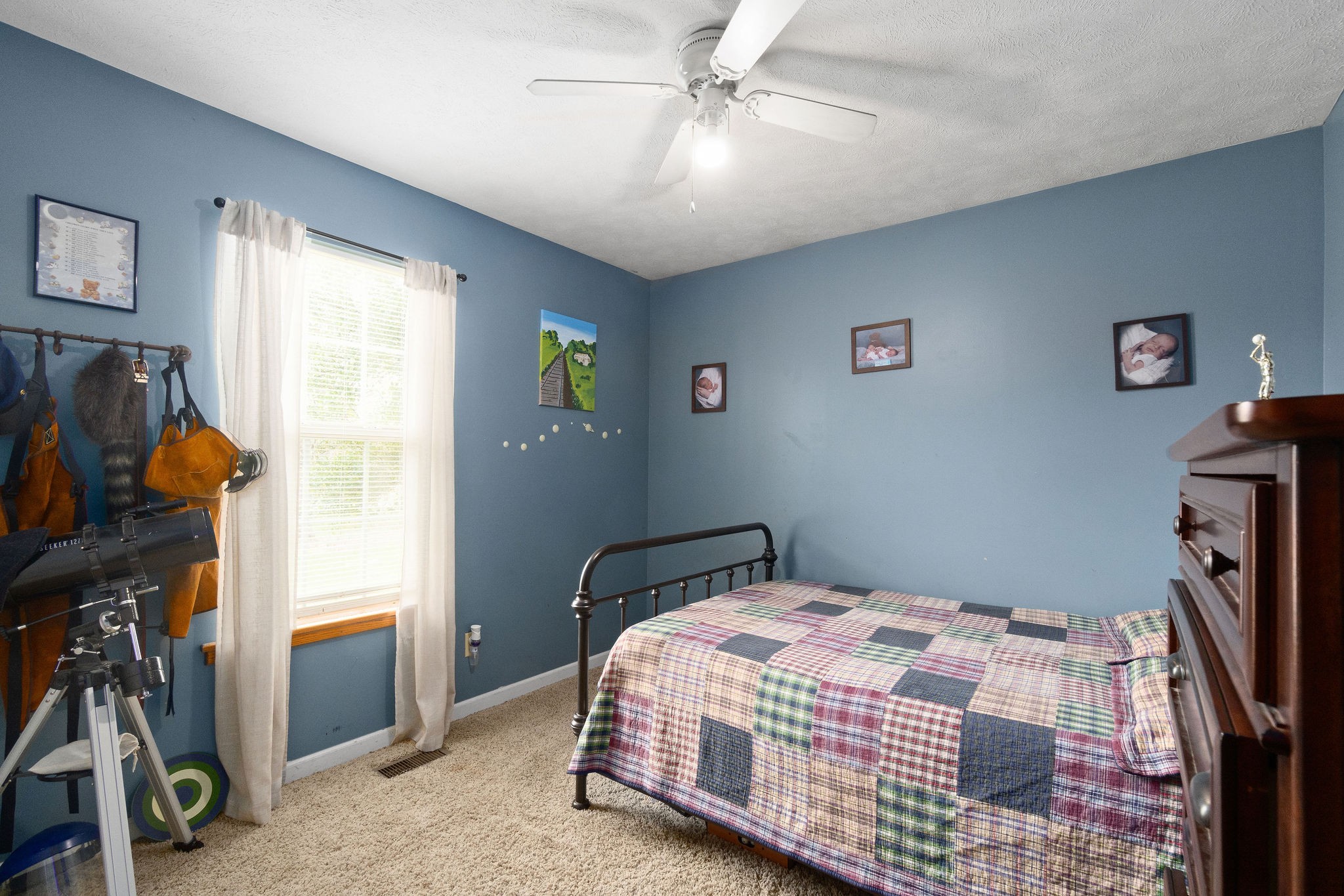 4450 Old Metal Road Palmyra, TN 37142 - Photo 20 of 38 a bedroom with a bed and a walk in closet