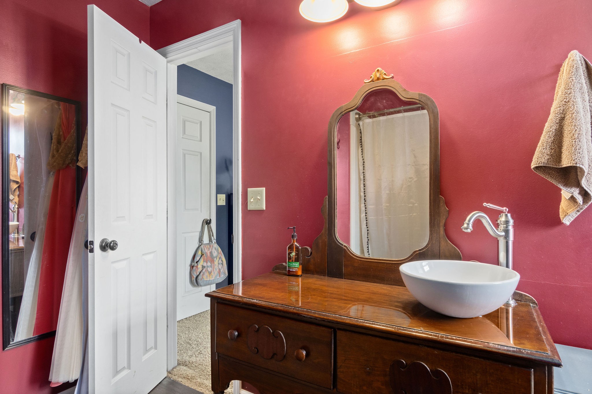 4450 Old Metal Road Palmyra, TN 37142 - Photo 24 of 38 a bathroom with a granite countertop sink and a mirror