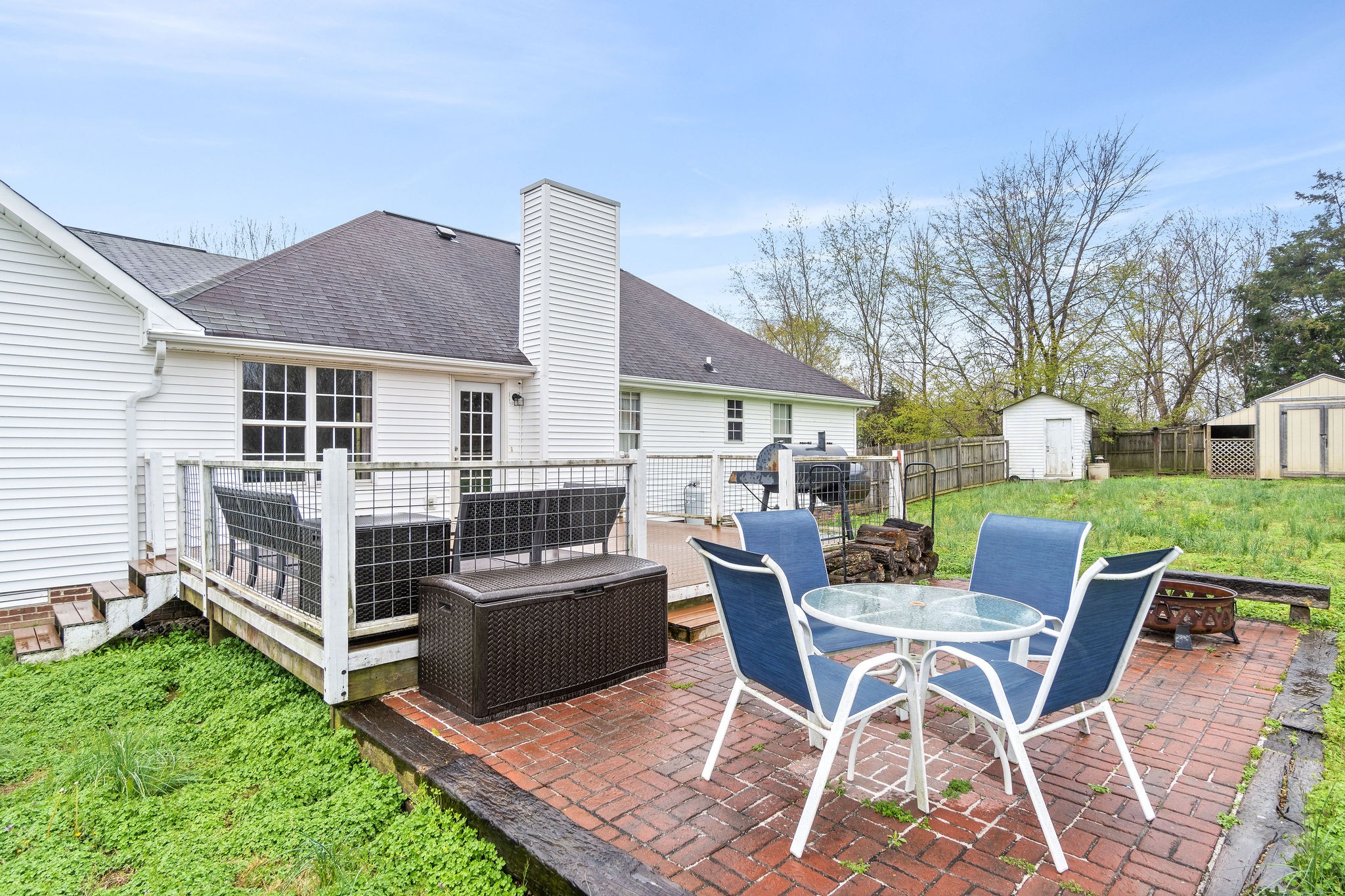 4450 Old Metal Road Palmyra, TN 37142 - Photo 27 of 38 a view of a house with backyard and sitting area