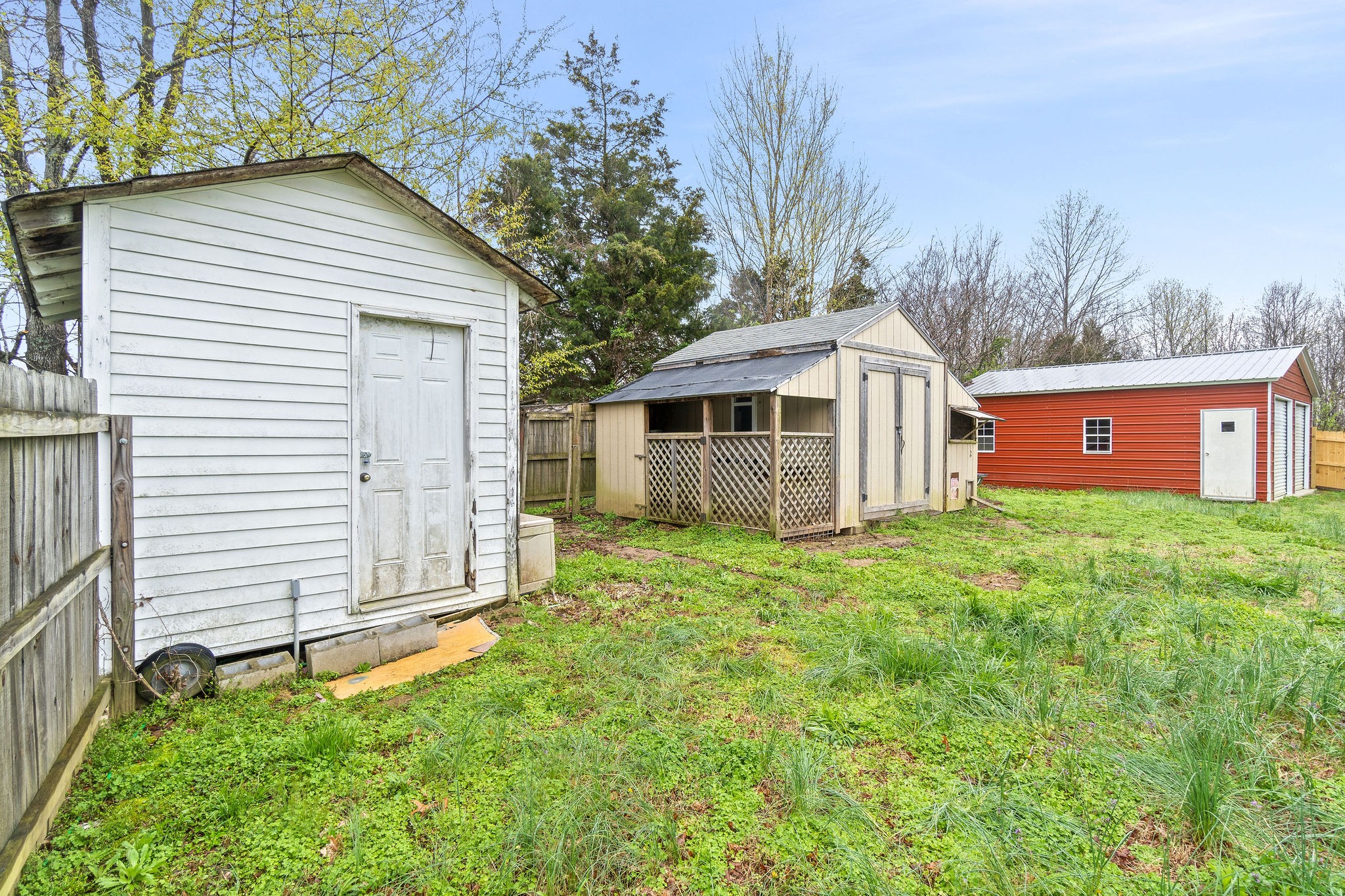 4450 Old Metal Road Palmyra, TN 37142 - Photo 33 of 38 a view of a house with a yard and fence