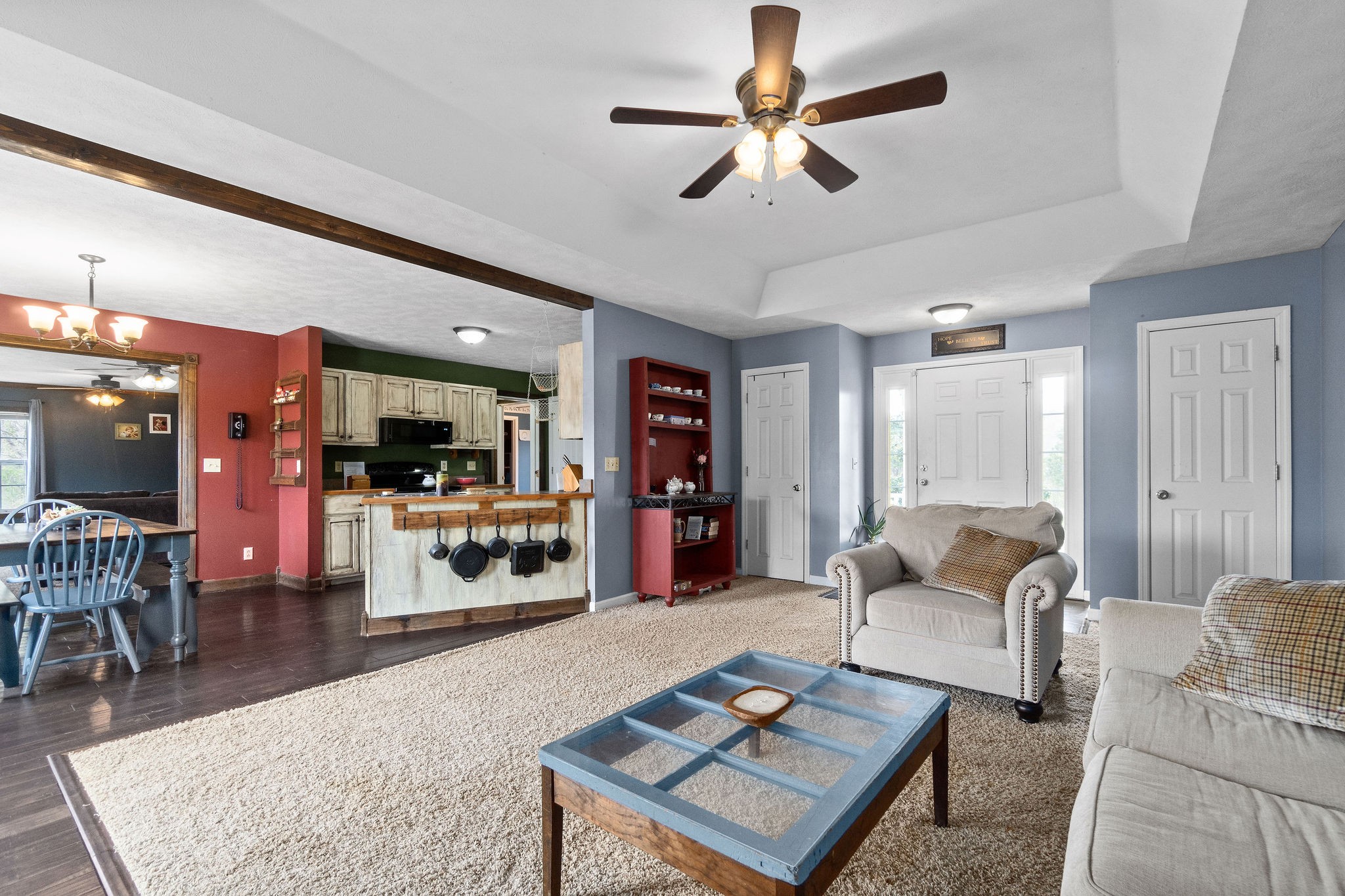 4450 Old Metal Road Palmyra, TN 37142 - Photo 6 of 38 a living room with furniture and a chandelier