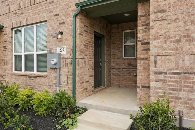 a view of kitchen with cabinets and wooden floor