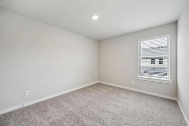 a workspace with furniture and a window