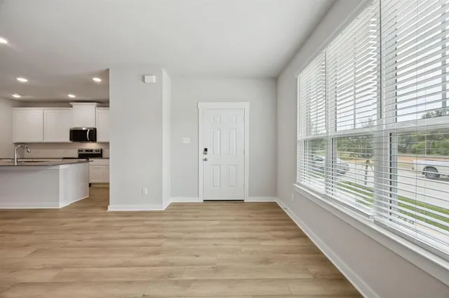 a view of an empty room and window