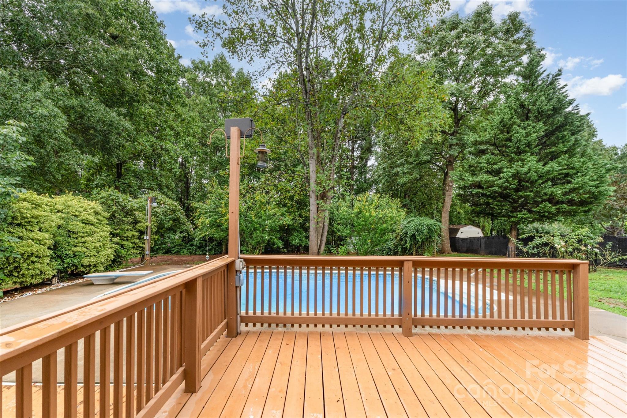 125 Stumpy Creek Road Mooresville, NC 28117 - Photo 16 of 23 a view of a wooden roof deck