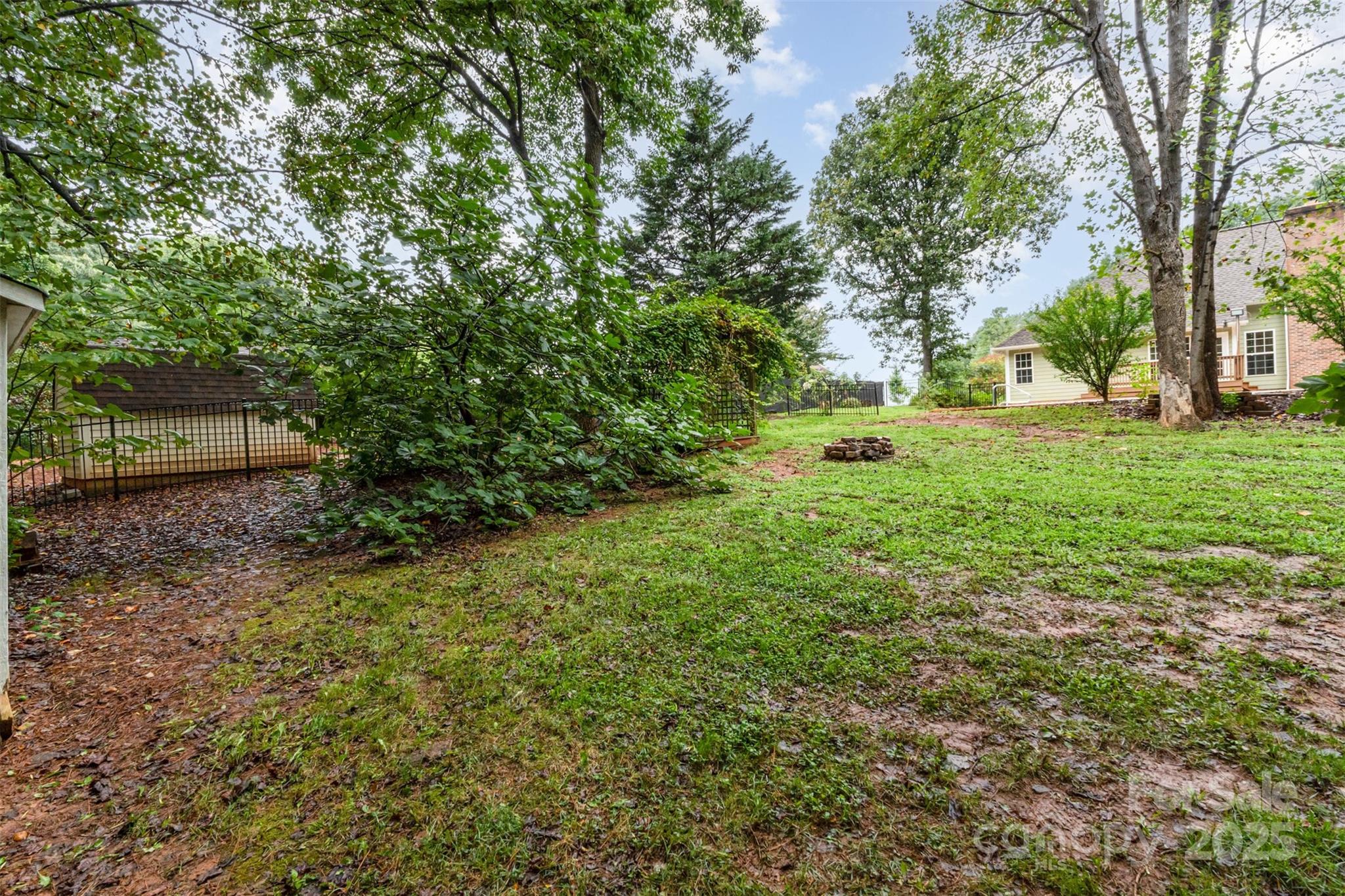125 Stumpy Creek Road Mooresville, NC 28117 - Photo 17 of 23 a view of backyard with green space