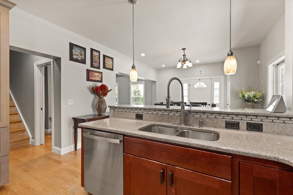 284 Maple Street, Unit 284 Middleton, MA 01949 - Photo 14 of 30 a bathroom with a sink and a mirror