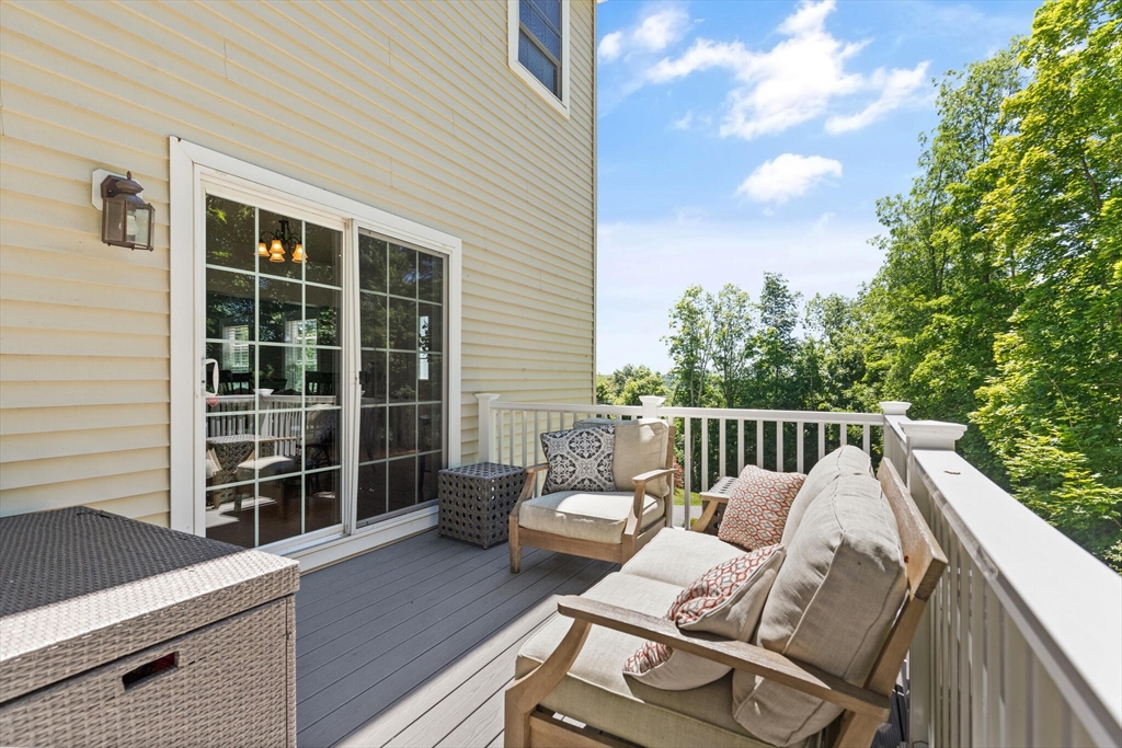 284 Maple Street, Unit 284 Middleton, MA 01949 - Photo 23 of 30 a balcony with furniture