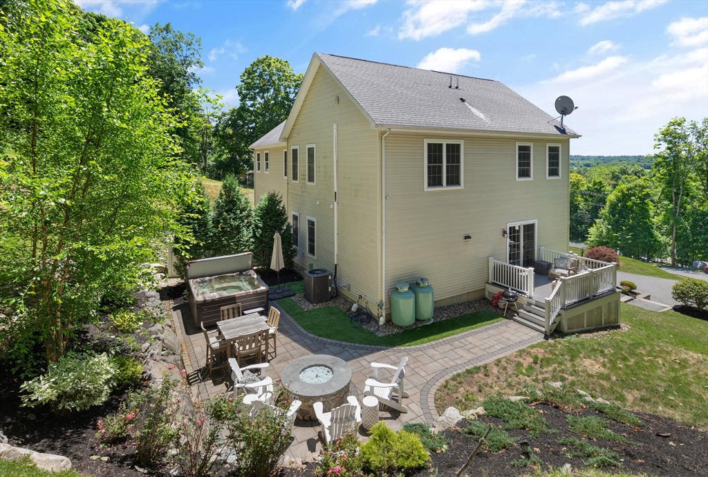 284 Maple Street, Unit 284 Middleton, MA 01949 - Photo 28 of 30 a view of a patio in backyard