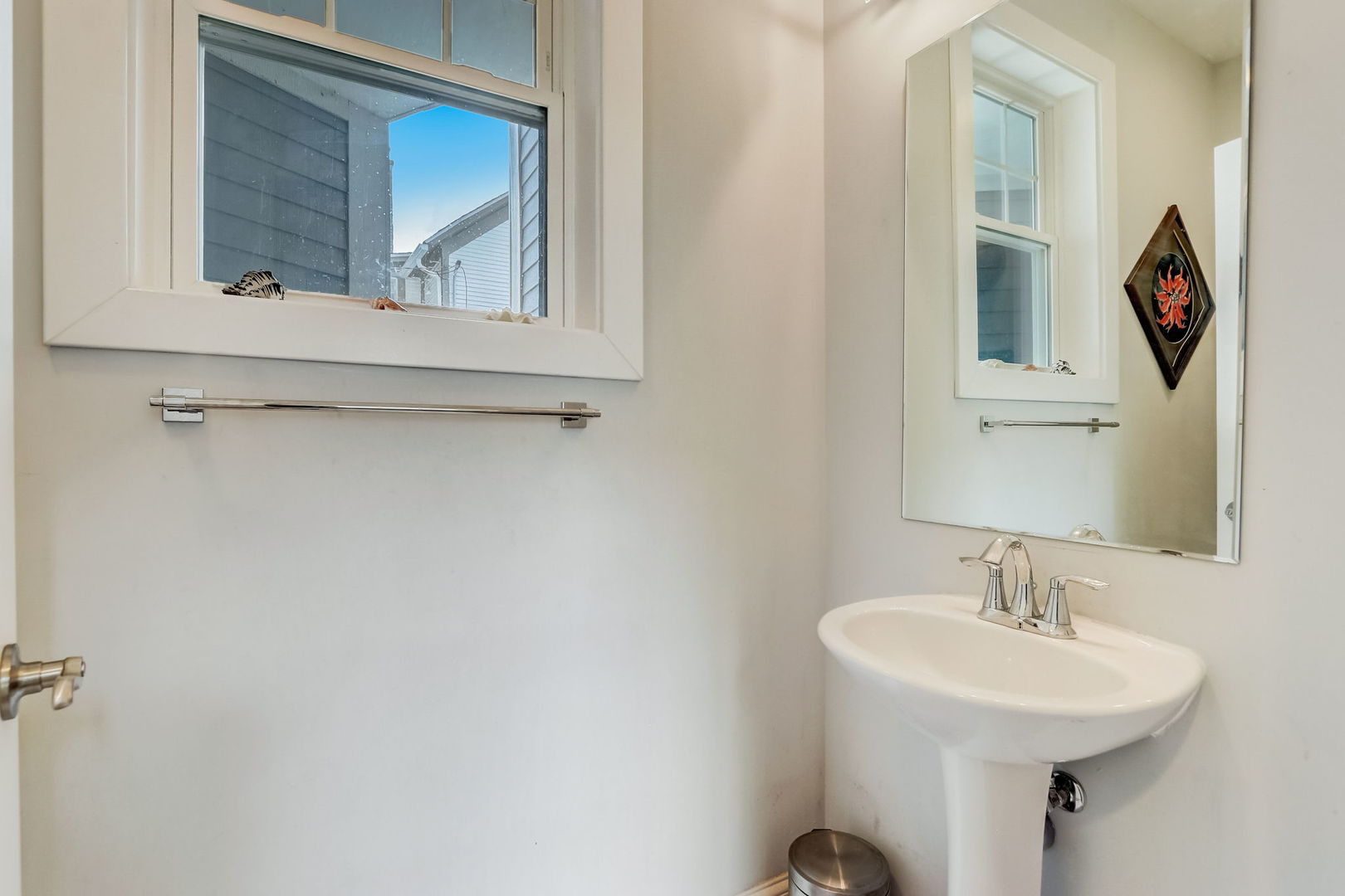 204 Fairbank Road Riverside, IL 60546 - Photo 11 of 35 a bathroom with a sink and a mirror