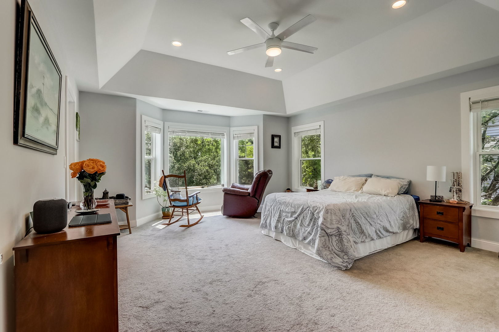 204 Fairbank Road Riverside, IL 60546 - Photo 12 of 35 a spacious bedroom with a bed and a chandelier