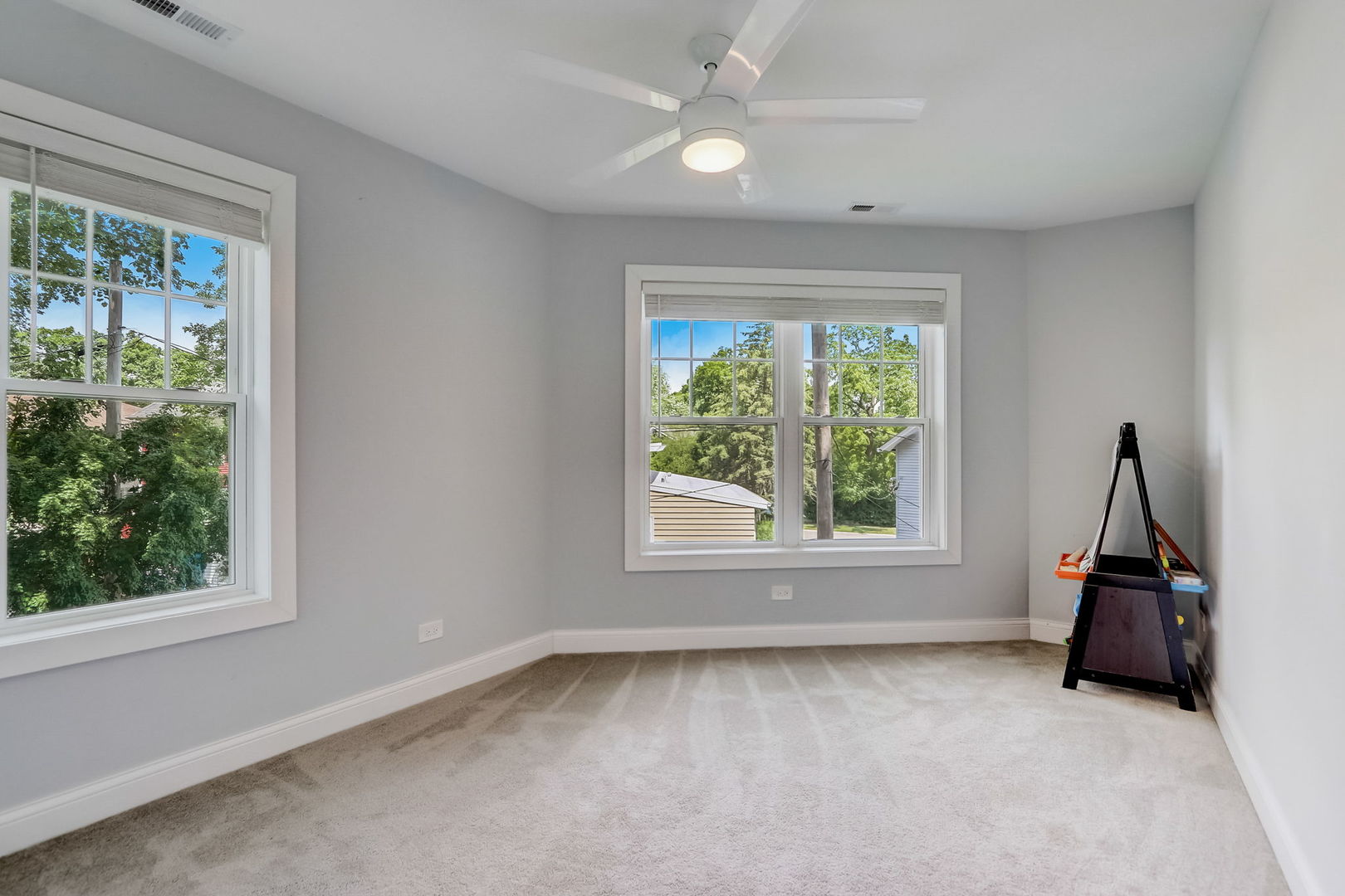 204 Fairbank Road Riverside, IL 60546 - Photo 17 of 35 a view of a room with gym equipment and a large window