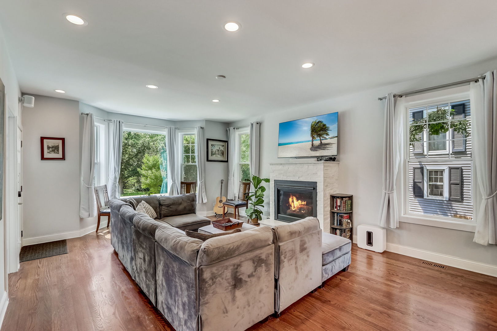 204 Fairbank Road Riverside, IL 60546 - Photo 4 of 35 a living room with fireplace furniture and a large window