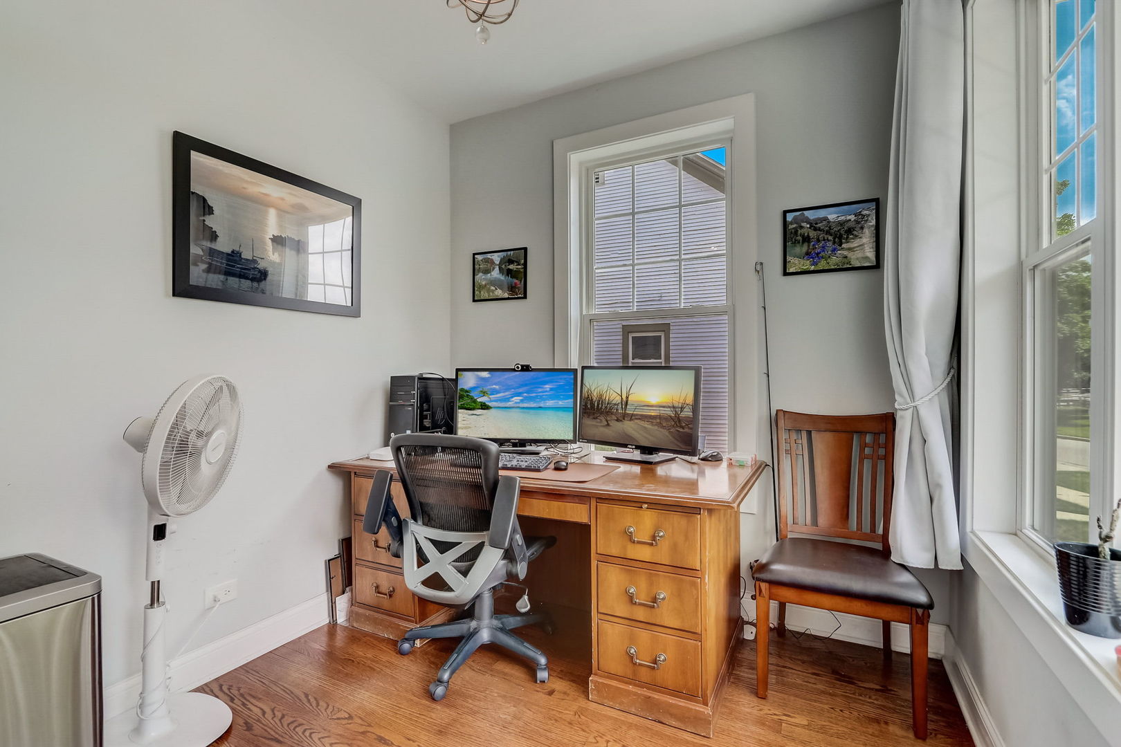 204 Fairbank Road Riverside, IL 60546 - Photo 10 of 35 a view of a workspace with furniture and a window