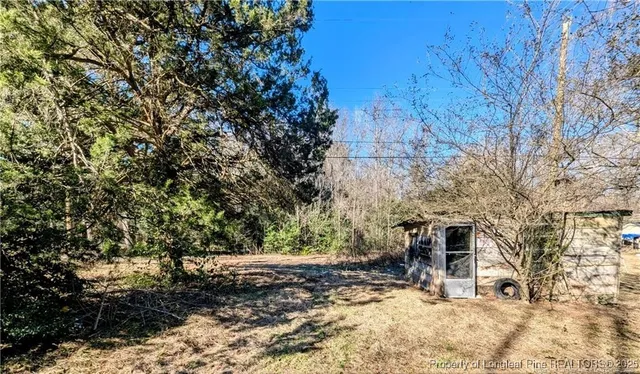 a view of outdoor space and yard