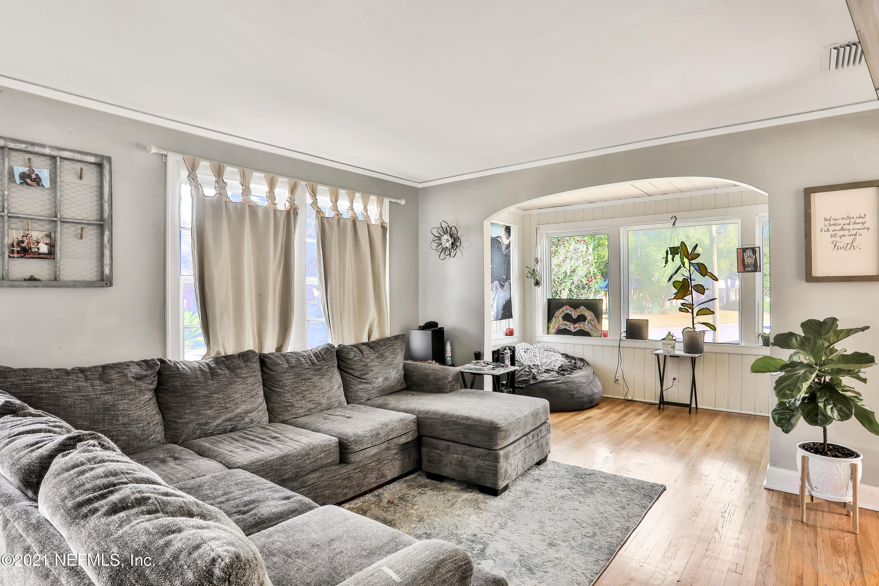 2130 Huntsford Road Jacksonville, FL 32207 - Photo 2 of 11 a living room with furniture and a large window