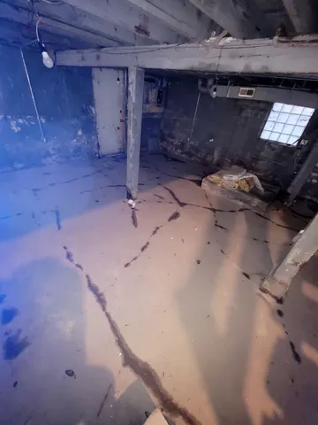 a pathway of a house with a yard