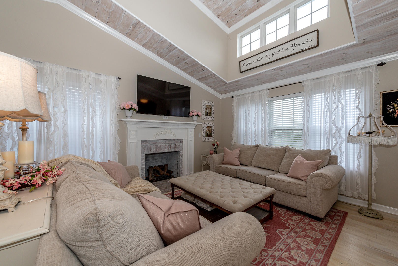 5017 Morganton Road Greenback, TN 37742 - Photo 11 of 40 a living room with furniture a fireplace and a flat screen tv