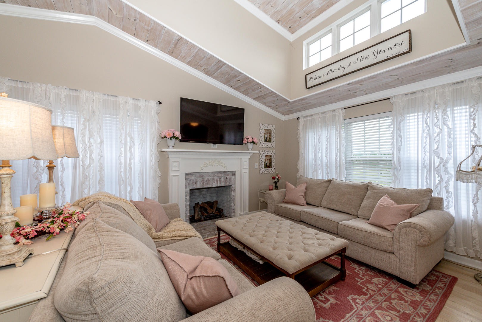 5017 Morganton Road Greenback, TN 37742 - Photo 13 of 40 a living room with furniture a flat screen tv and a fireplace