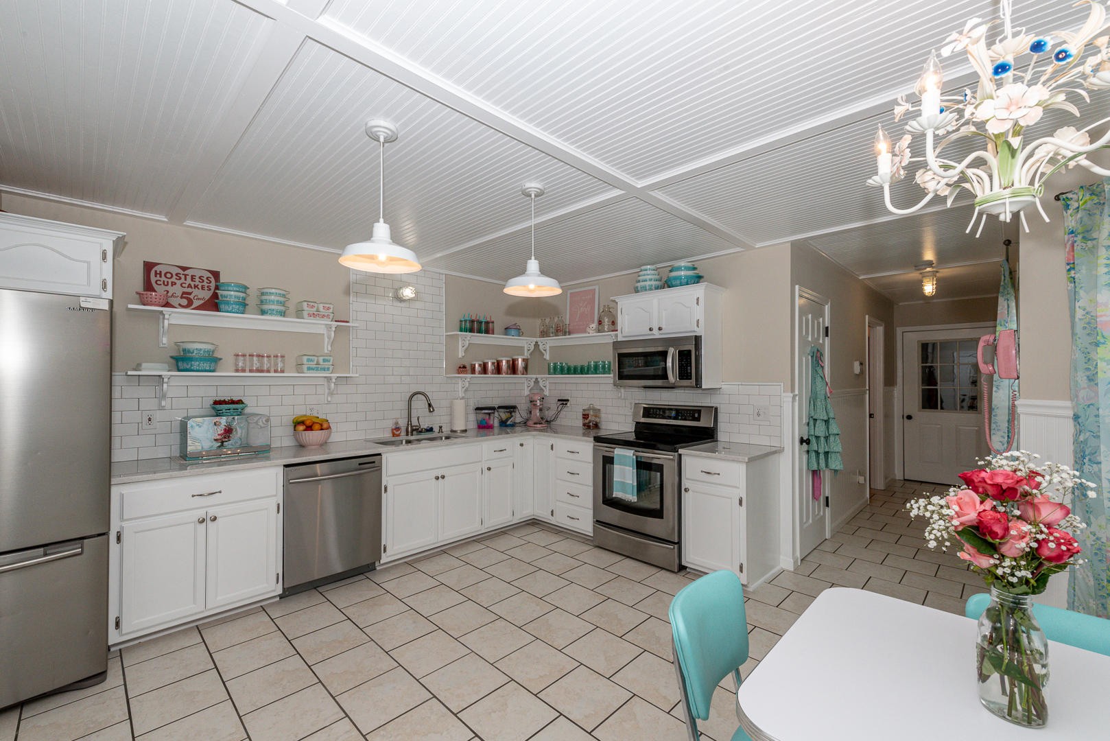 5017 Morganton Road Greenback, TN 37742 - Photo 19 of 40 a kitchen with a sink window and stainless steel appliances
