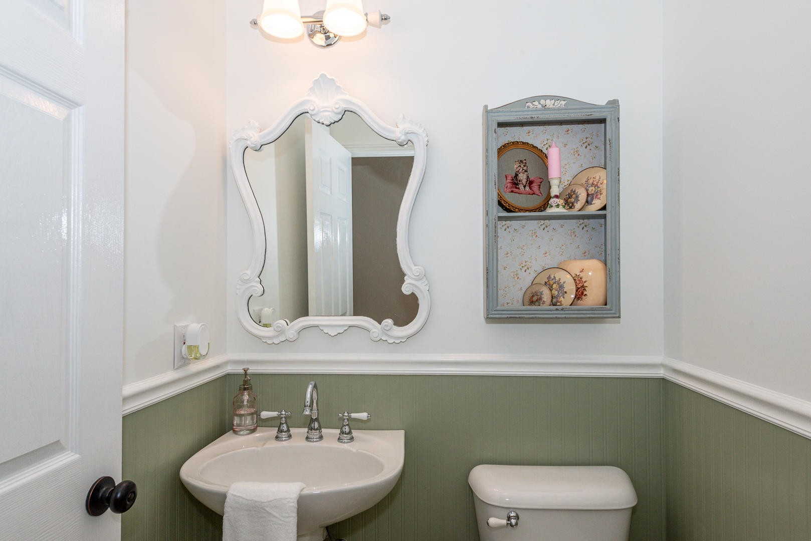 5017 Morganton Road Greenback, TN 37742 - Photo 24 of 40 a bathroom with a toilet sink and mirror