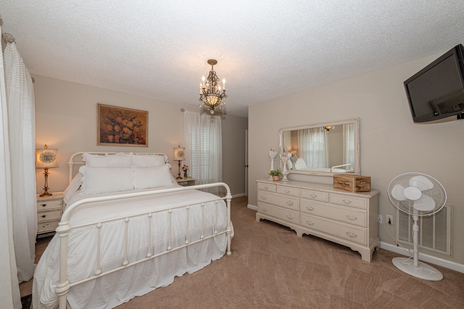 5017 Morganton Road Greenback, TN 37742 - Photo 27 of 40 a bedroom with a bed and a flat screen tv