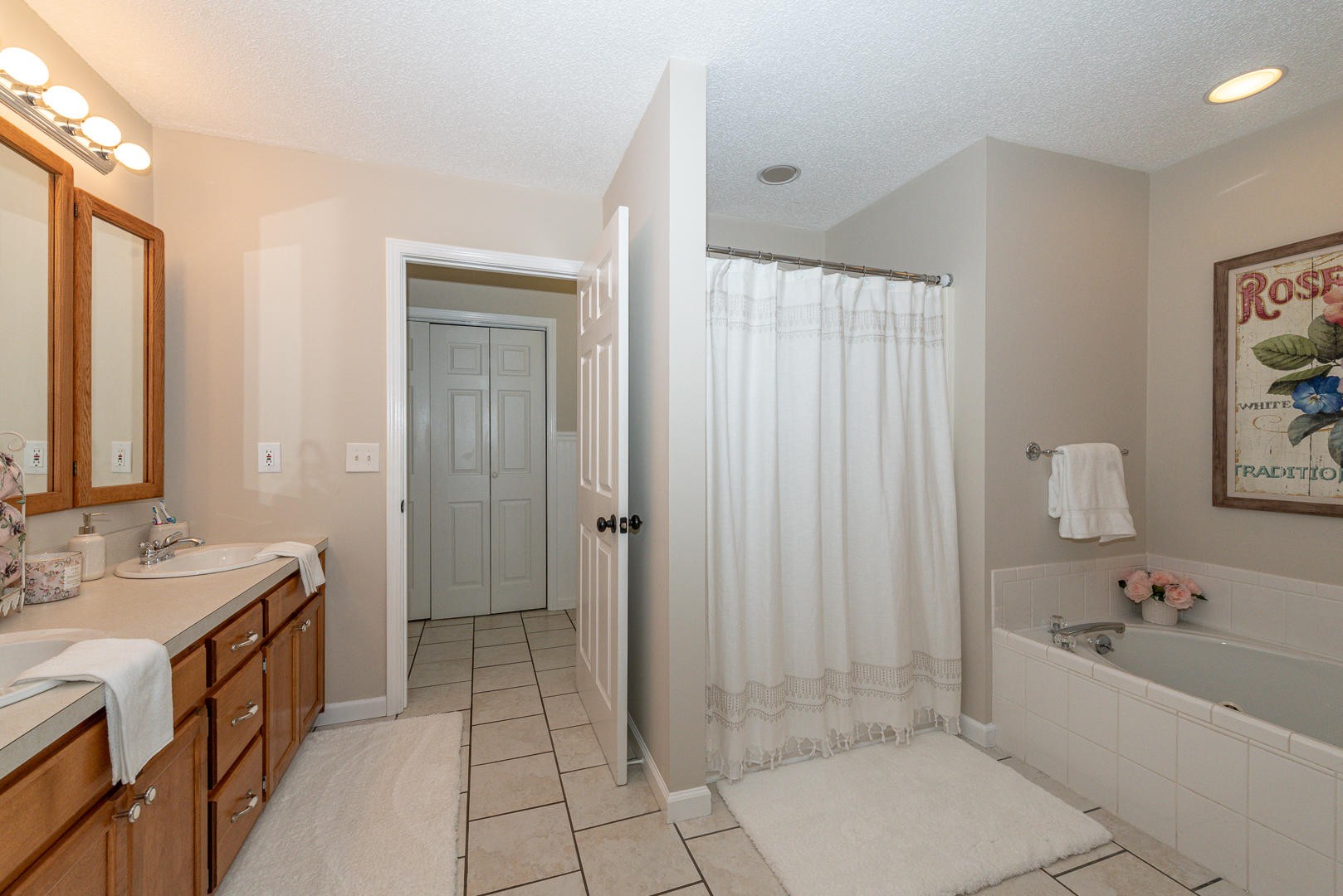 5017 Morganton Road Greenback, TN 37742 - Photo 28 of 40 a spacious bathroom with a tub shower and sink