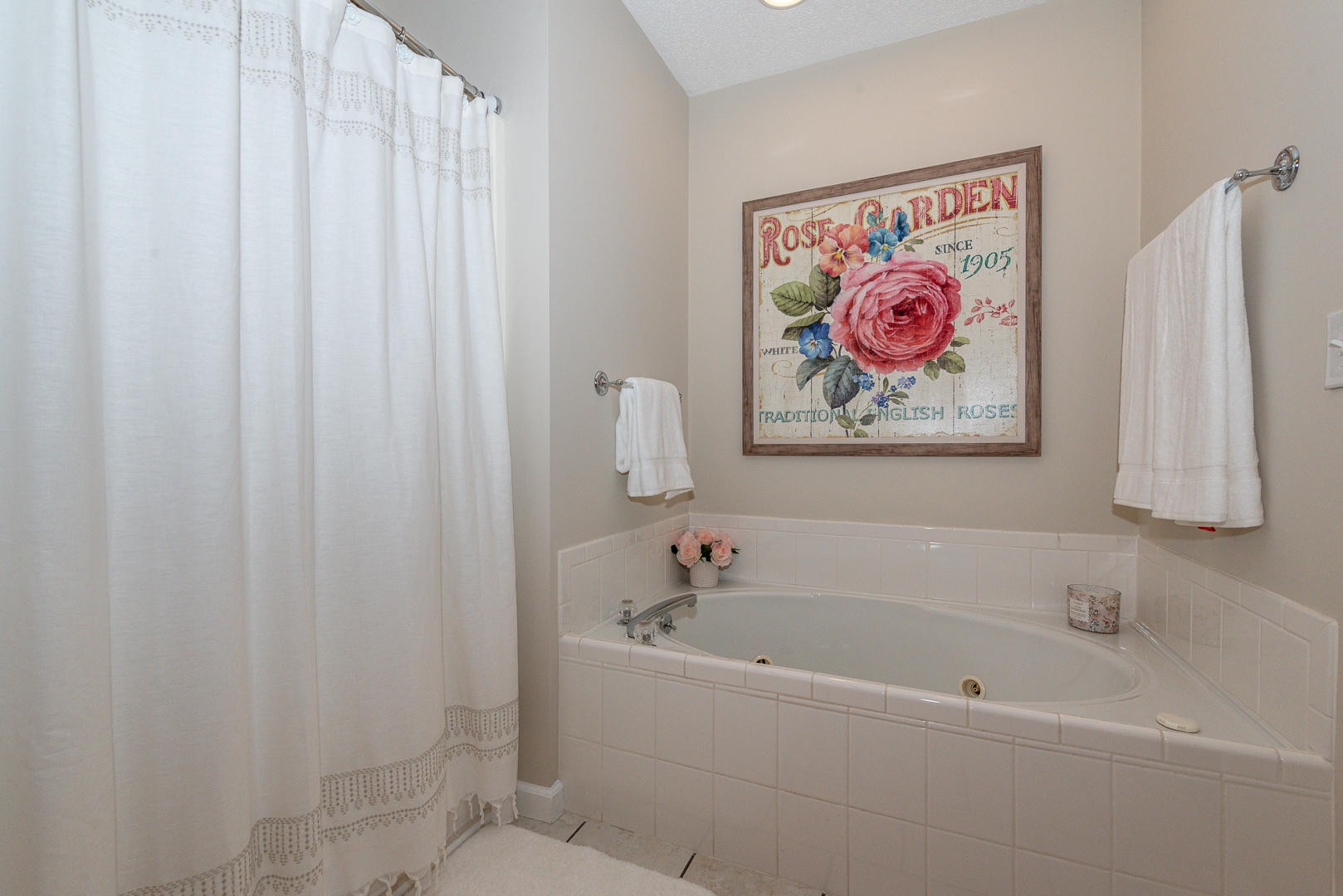 5017 Morganton Road Greenback, TN 37742 - Photo 29 of 40 a bathroom with a bathtub and shower curtain