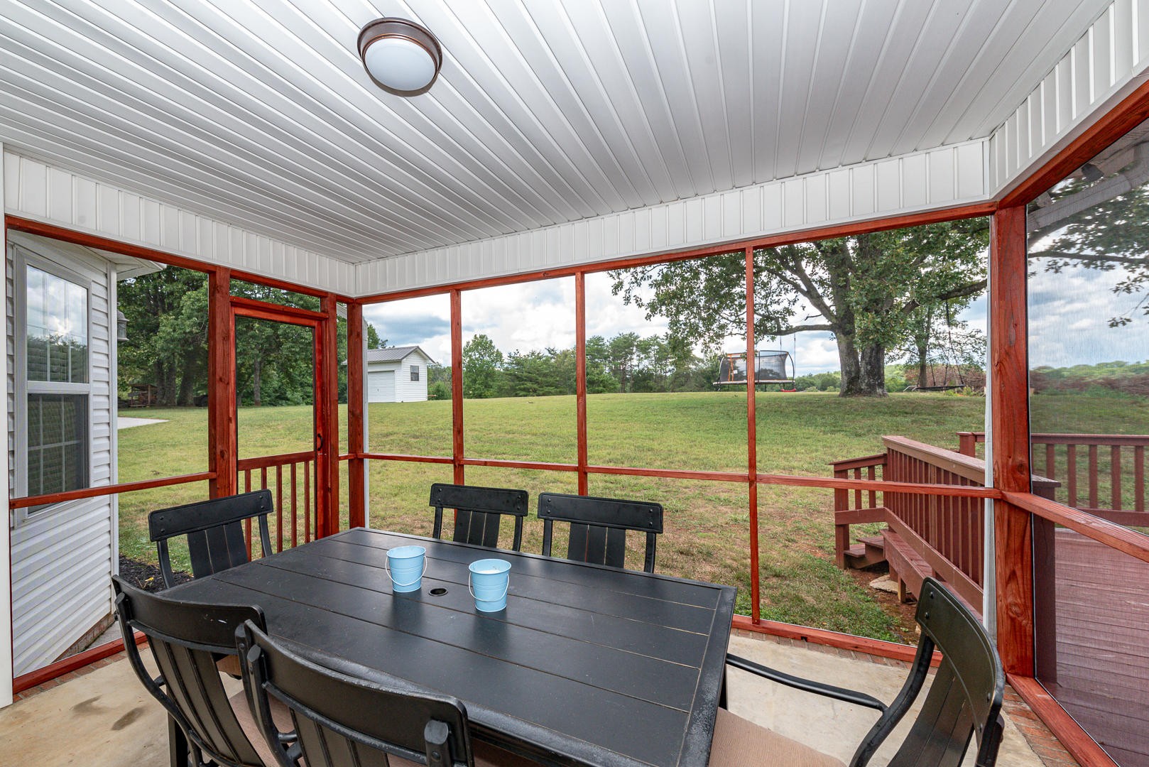 5017 Morganton Road Greenback, TN 37742 - Photo 36 of 40 a view of a dining room with furniture and a floor to ceiling window