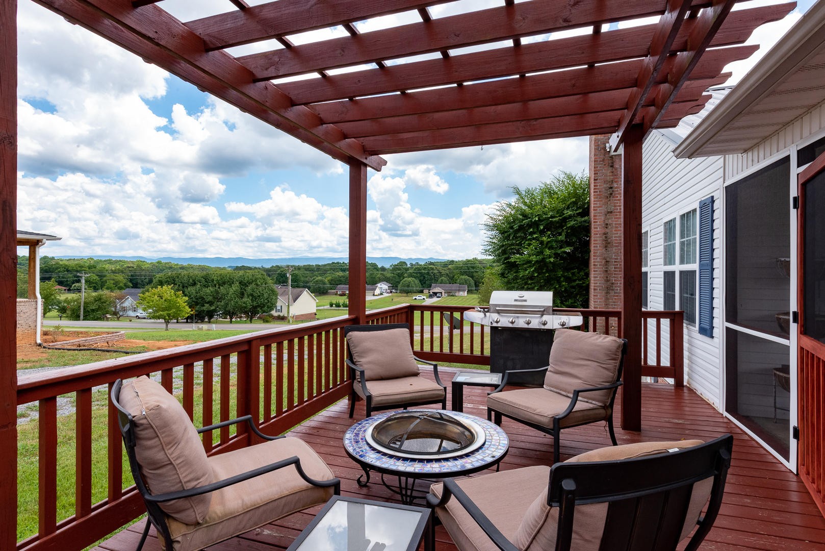 5017 Morganton Road Greenback, TN 37742 - Photo 38 of 40 a view of a porch with furniture and a yard