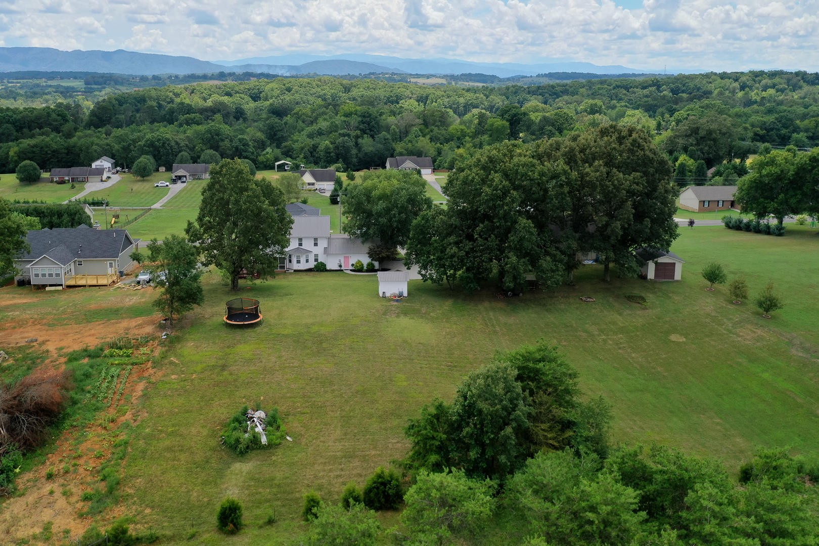 5017 Morganton Road Greenback, TN 37742 - Photo 5 of 40 a view of a lake with a yard