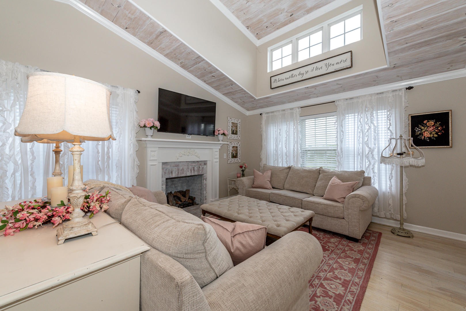 5017 Morganton Road Greenback, TN 37742 - Photo 10 of 40 a living room with furniture a flat screen tv and a fireplace