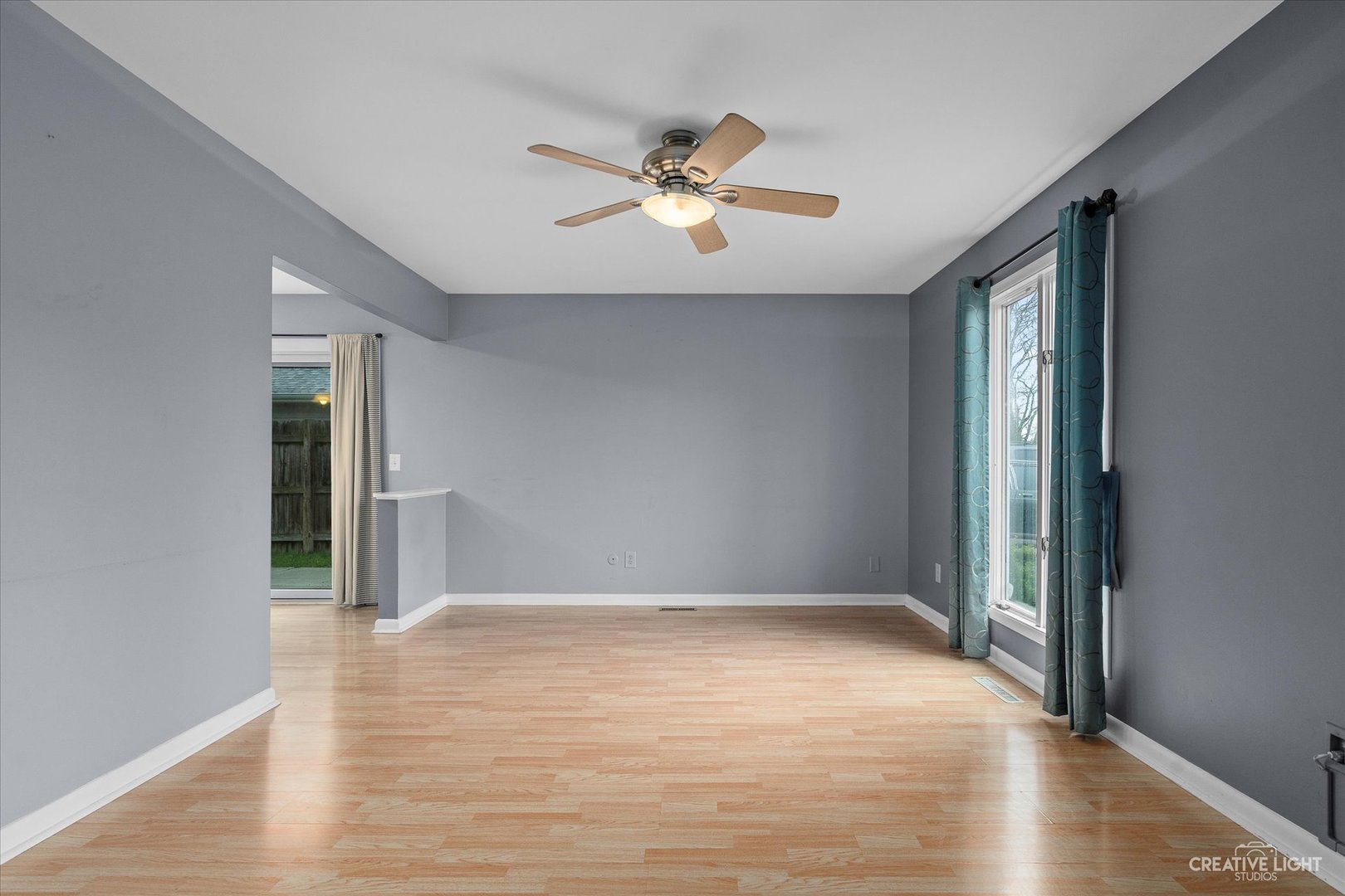 6 Ingleshire Road Montgomery, IL 60538 - Photo 3 of 16 wooden floor in an empty room with a window