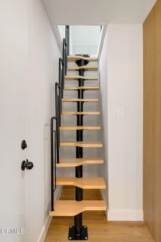 a view of entryway with wooden floor