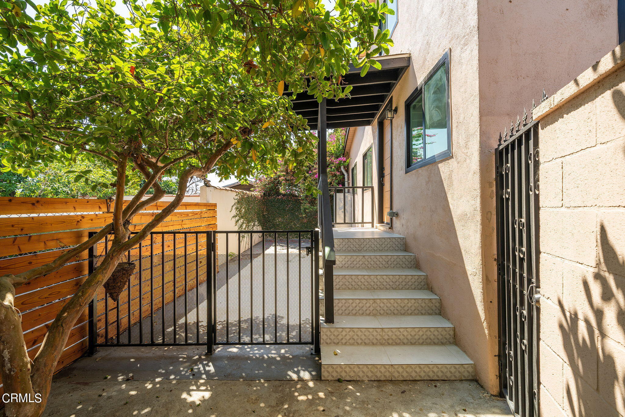 2138 1/2 Santa Ynez Street Los Angeles, CA 90026 - Photo 19 of 22 a view of entryway with wooden floor and fence
