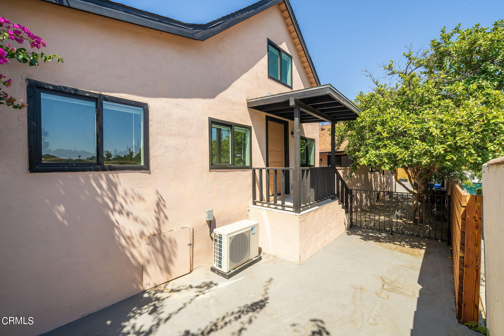 2138 1/2 Santa Ynez Street Los Angeles, CA 90026 - Photo 20 of 22 a front view of a house with a yard