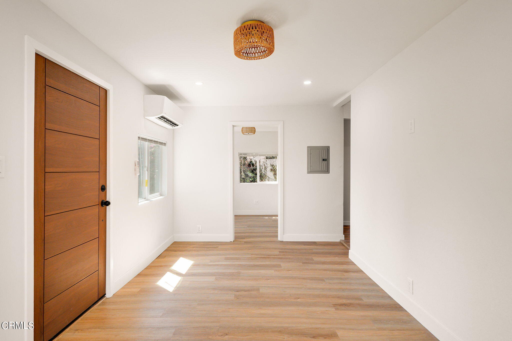 2138 1/2 Santa Ynez Street Los Angeles, CA 90026 - Photo 4 of 22 a view of a refrigerator in kitchen and wooden floor