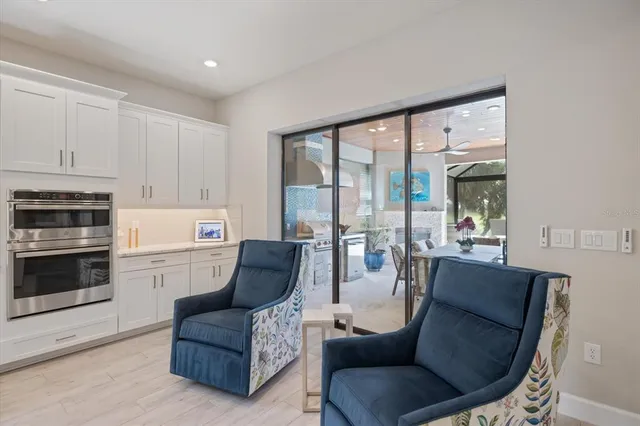 a view of a patio with a table chairs and a patio