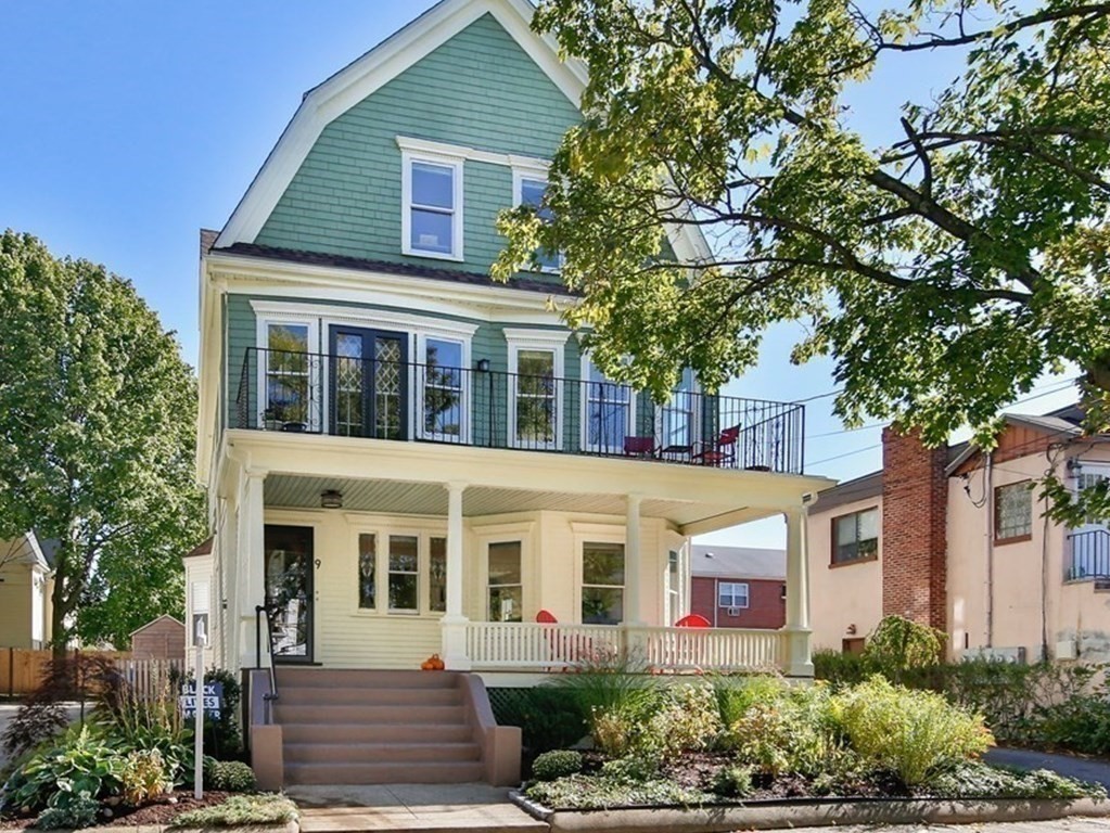 9 Trowbridge Street Arlington, MA 02474 - Photo 22 of 22 a front view of a house with a yard