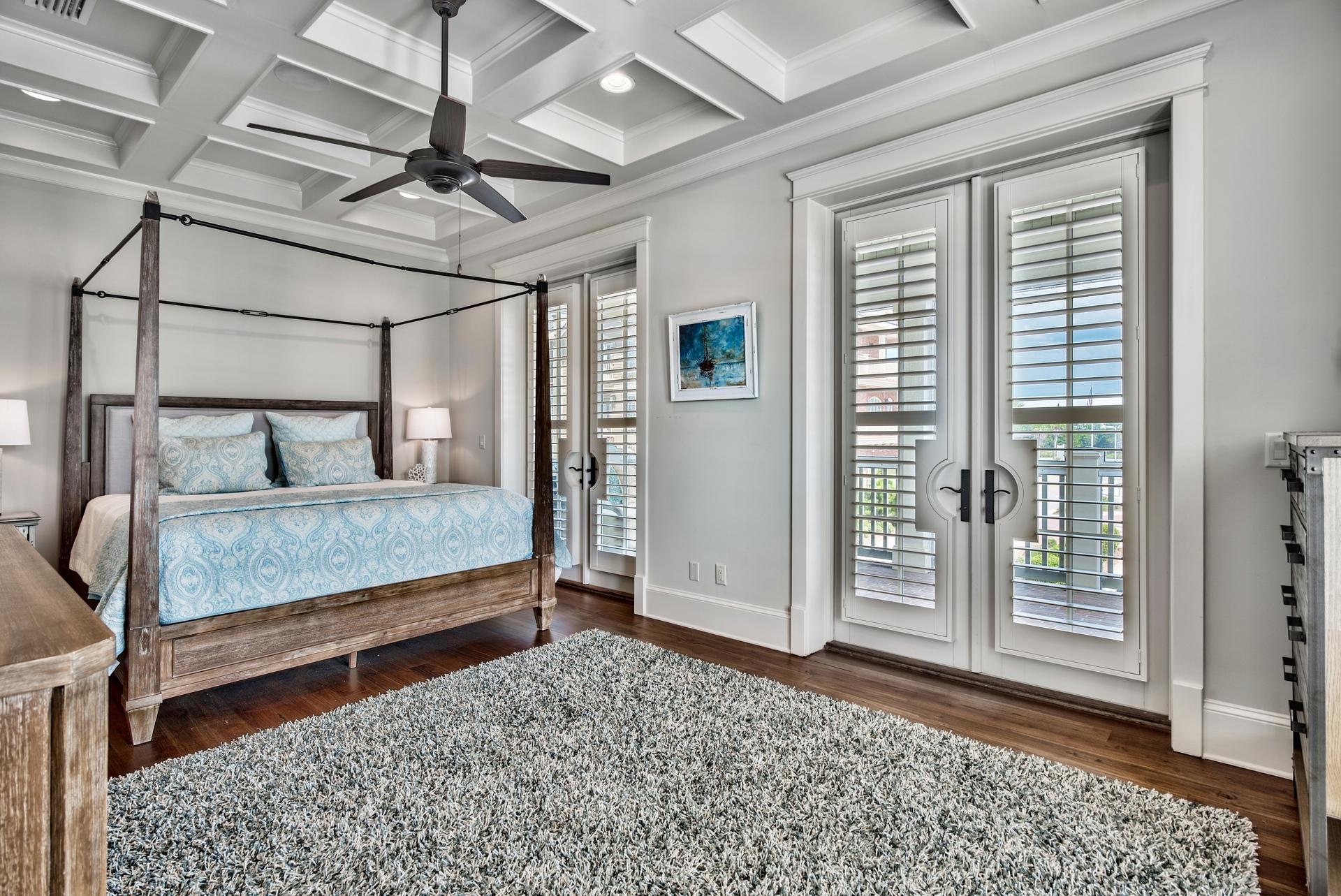 70 Pleasant Street Inlet Beach, FL 32461 - Photo 16 of 38 a bedroom with furniture and a rug