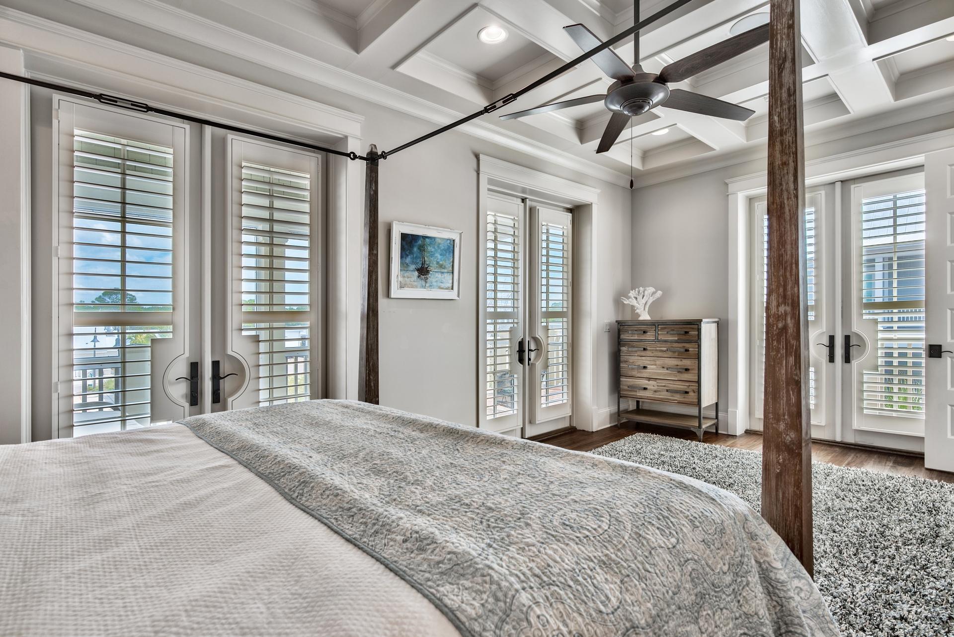 70 Pleasant Street Inlet Beach, FL 32461 - Photo 17 of 38 a spacious bedroom with a large bed and a large window