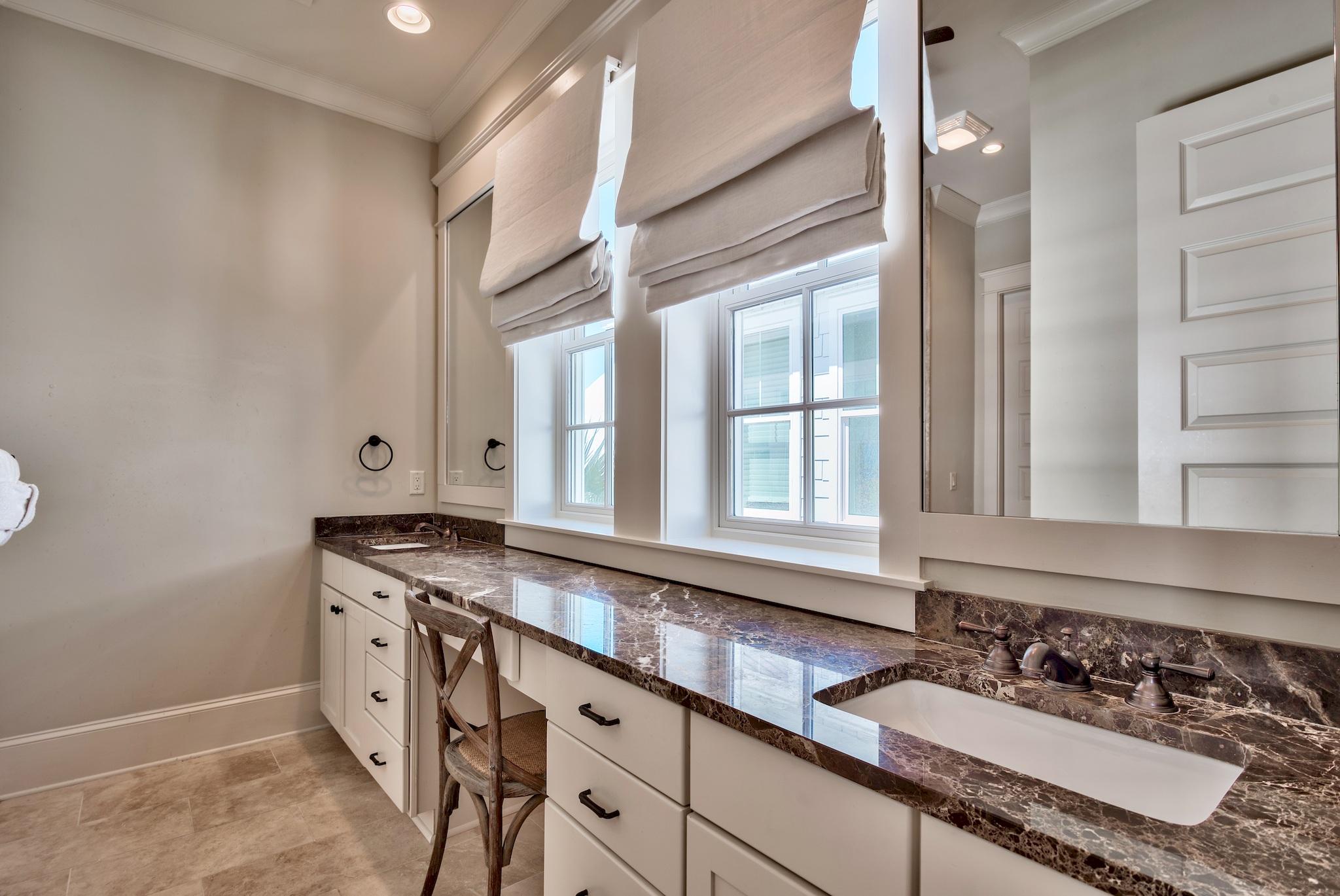 70 Pleasant Street Inlet Beach, FL 32461 - Photo 18 of 38 a bathroom with a granite countertop sink and a window